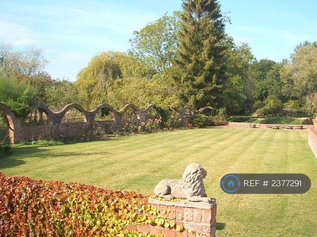 Rear Lawn And Serpentine Wall