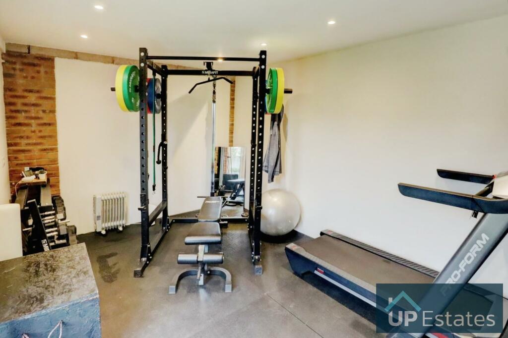 Converted Garage Gym.jpg