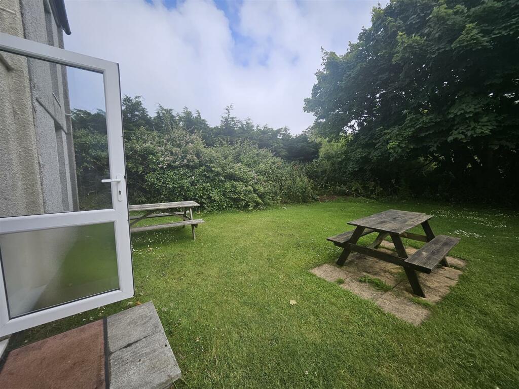 Rear seating area, from kitchen