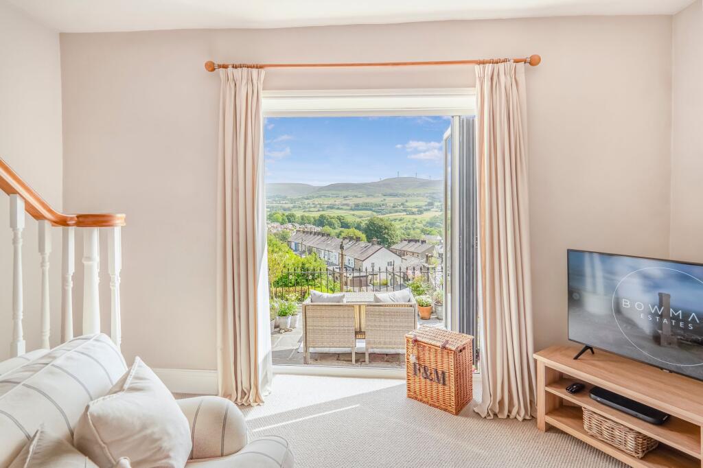 Second-Floor Lounge with Balcony