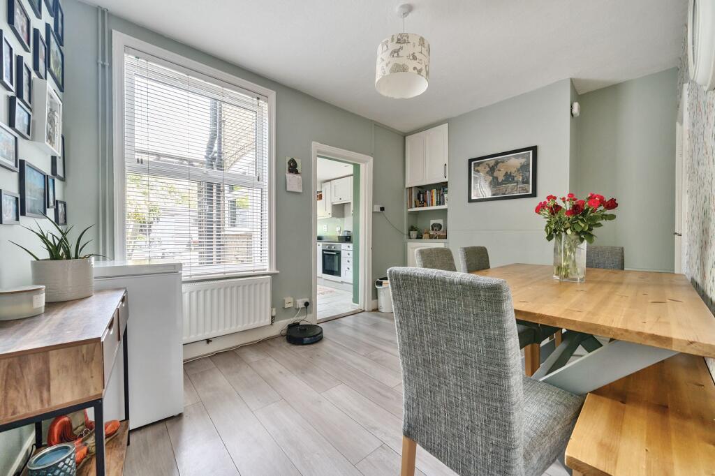 Dining room leading into kitchen