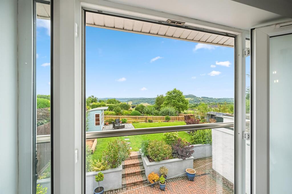 Bedroom One - Juliet balcony and view.jpg