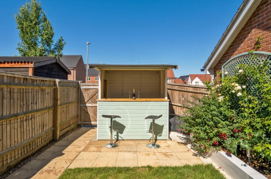 Timber Bar Storage with patio area