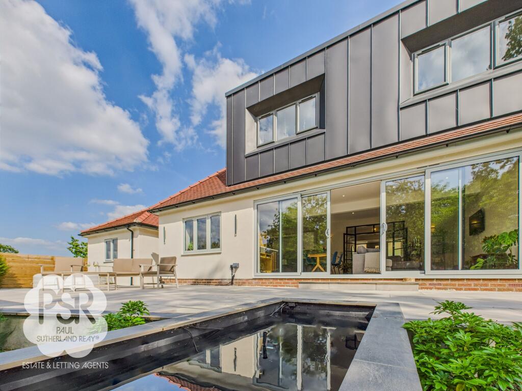 Elegant Porcelain Patio and Pond