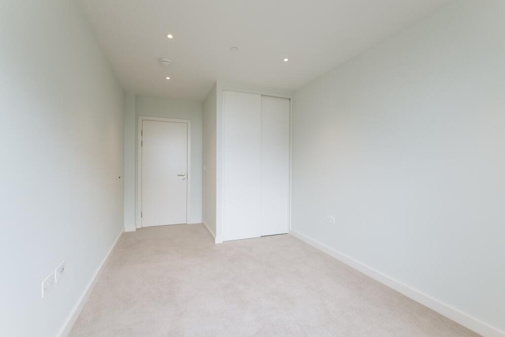 Experience the elegance of minimalist design in this versatile space, ready to be personalized.