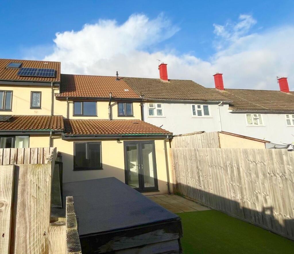 Rear view of property and patio.jpg