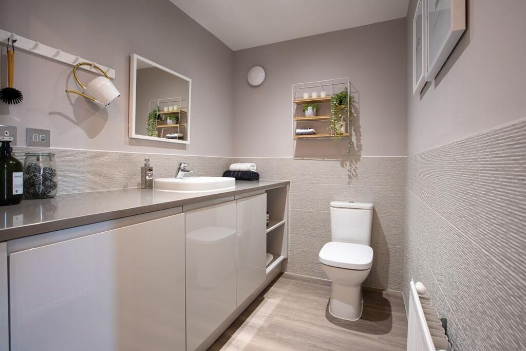 Combined cloakroom and laundry room