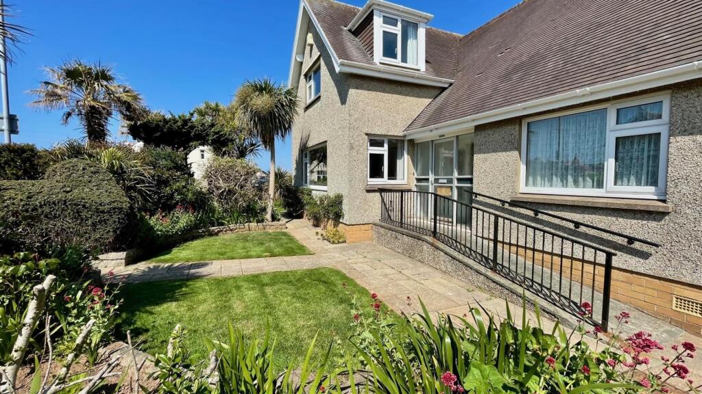 FRONT AND SIDE GARDENS