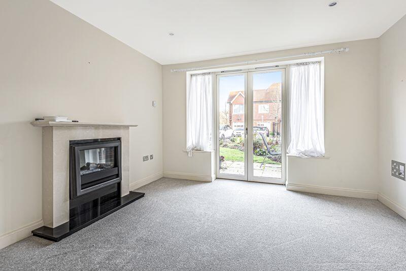 Living/dining room with fireplace and...