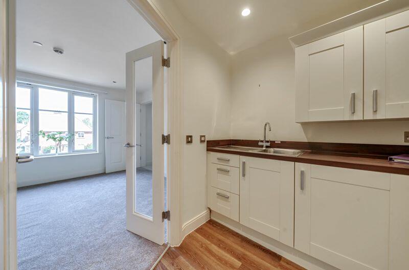 Living/dining room through to kitchen
