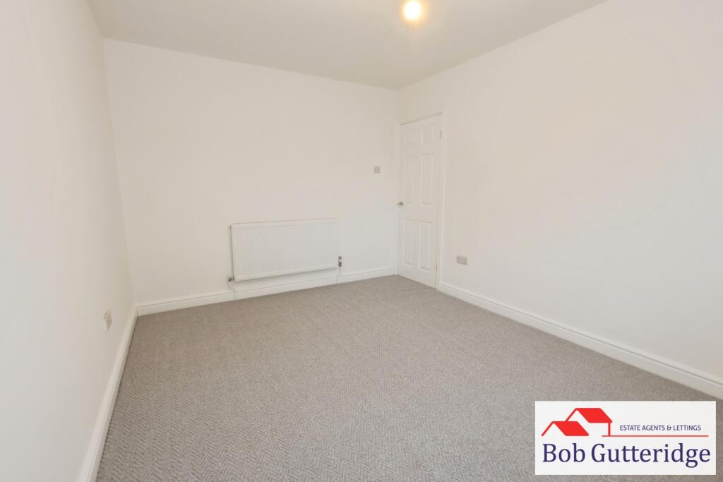 BEDROOM ONE (REAR)
