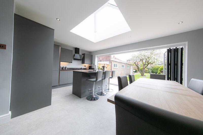 Dining area, kitchen &amp; bi-fold do...