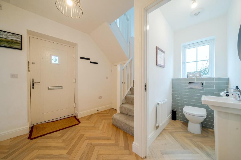 Entrance through WC.jpg
