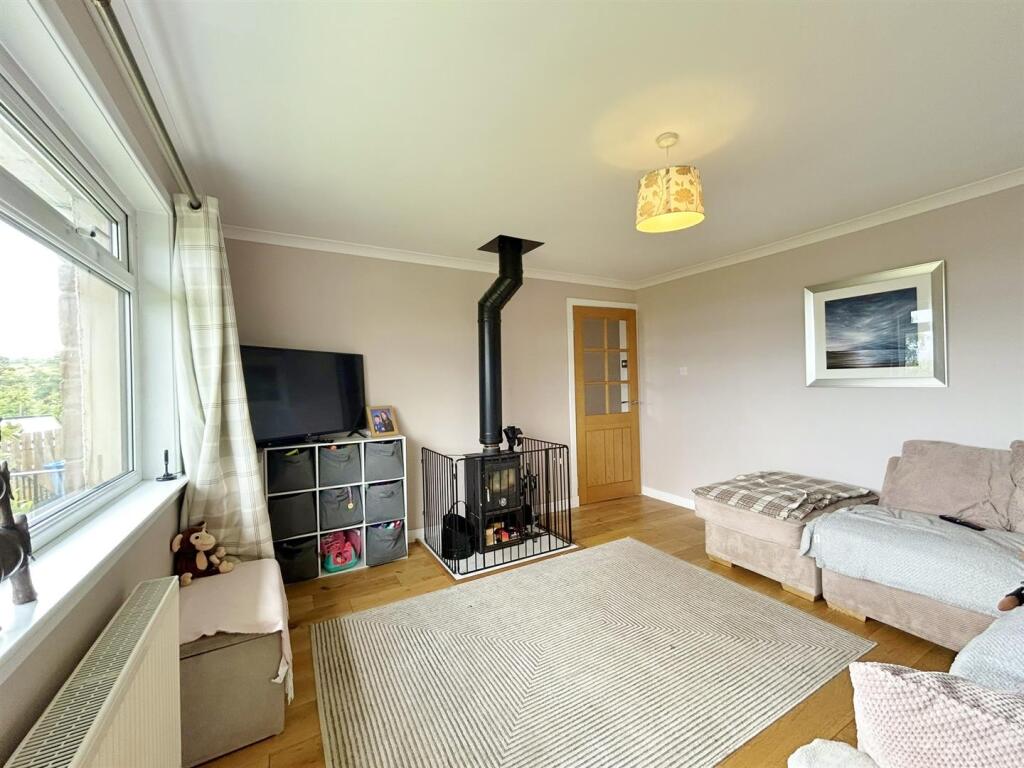 Lounge showing log burner