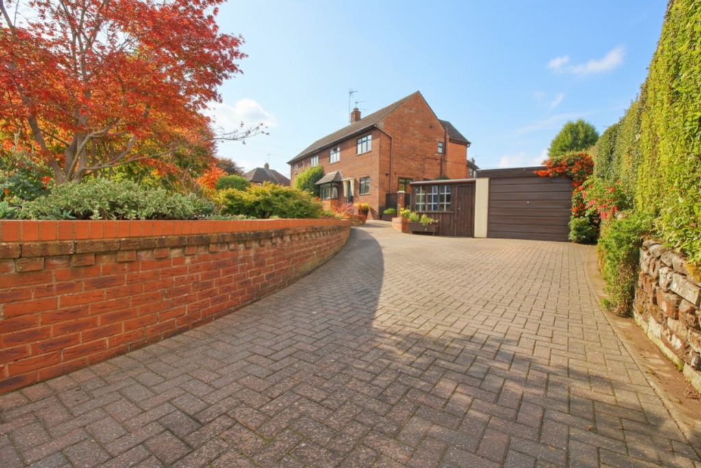 View of Property at Front and Driveway