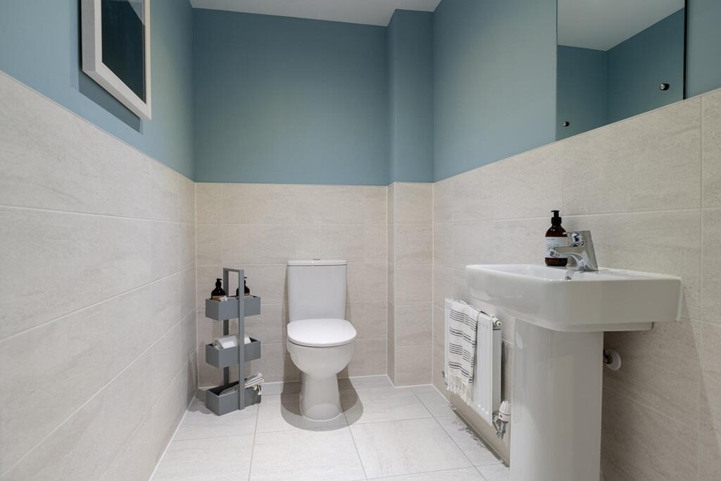 A handy downstairs toilet sits in the middle of the home