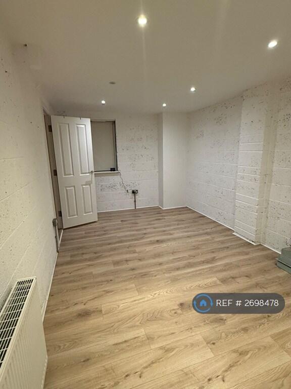 Covered Garage Space And Utility Room 