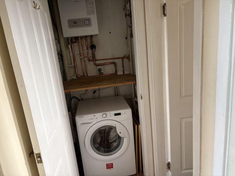 Cupboard with washing machine