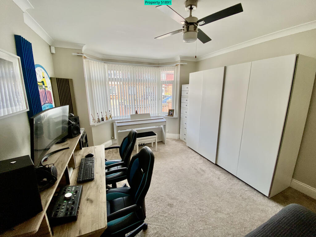 Front bedroom / used as music studio