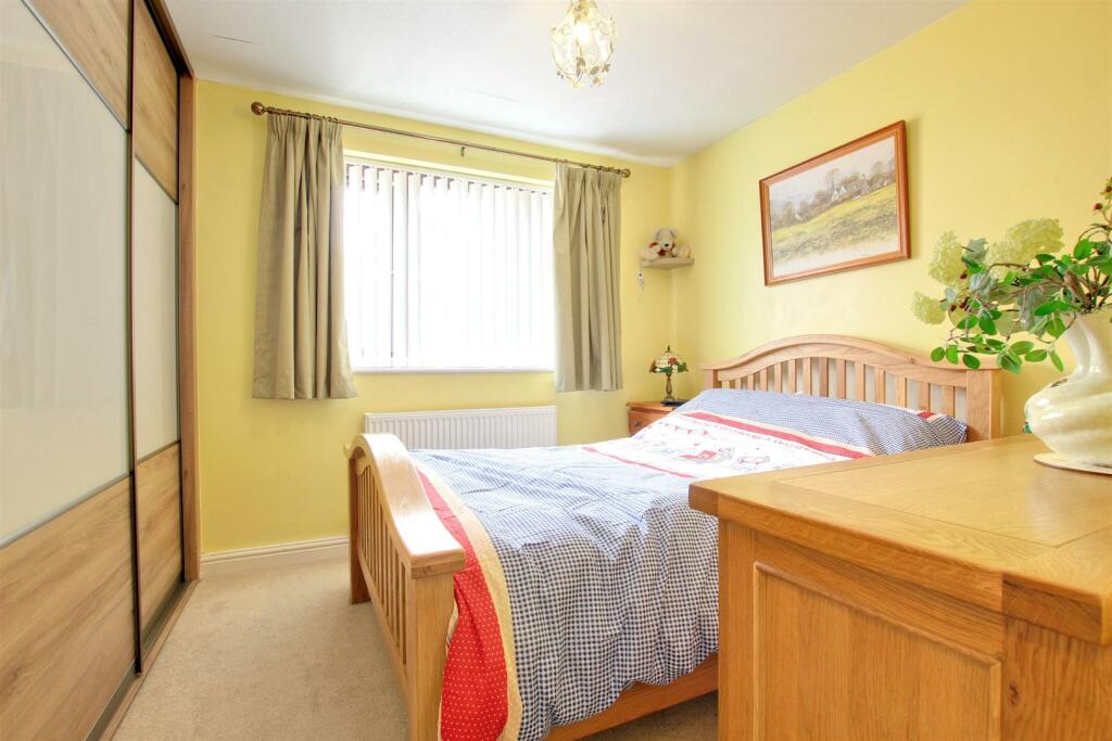 BEDROOM 1 (REAR)