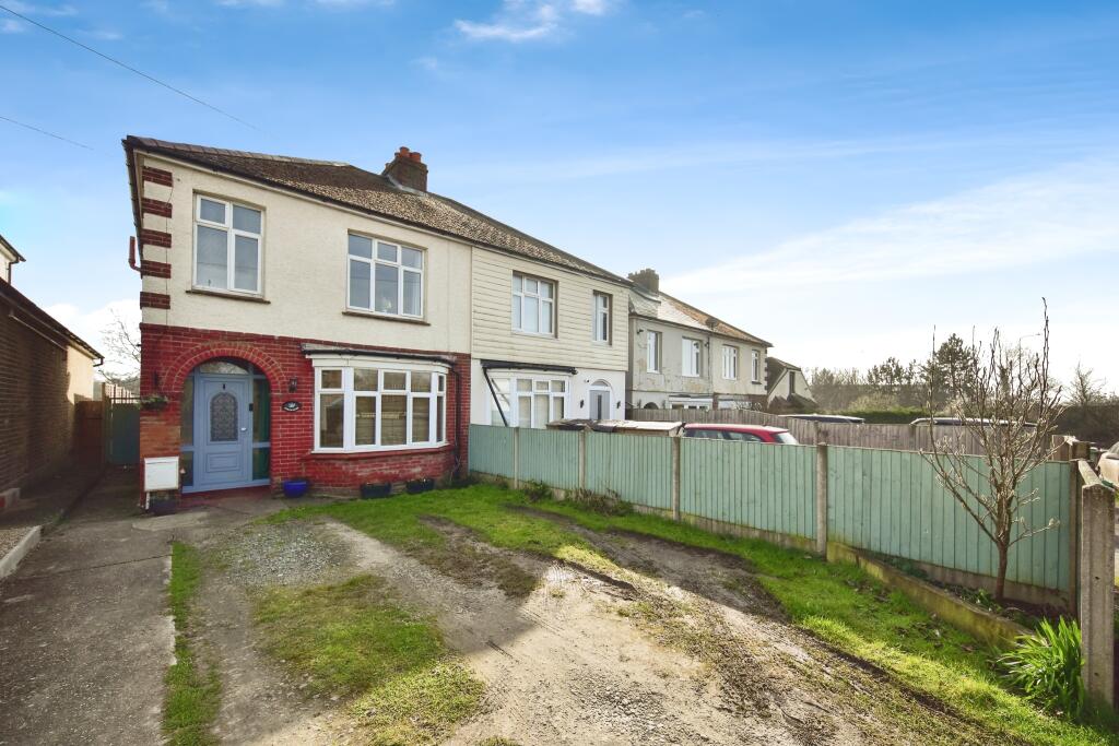 Outside View Of The Property With Driveway Parking