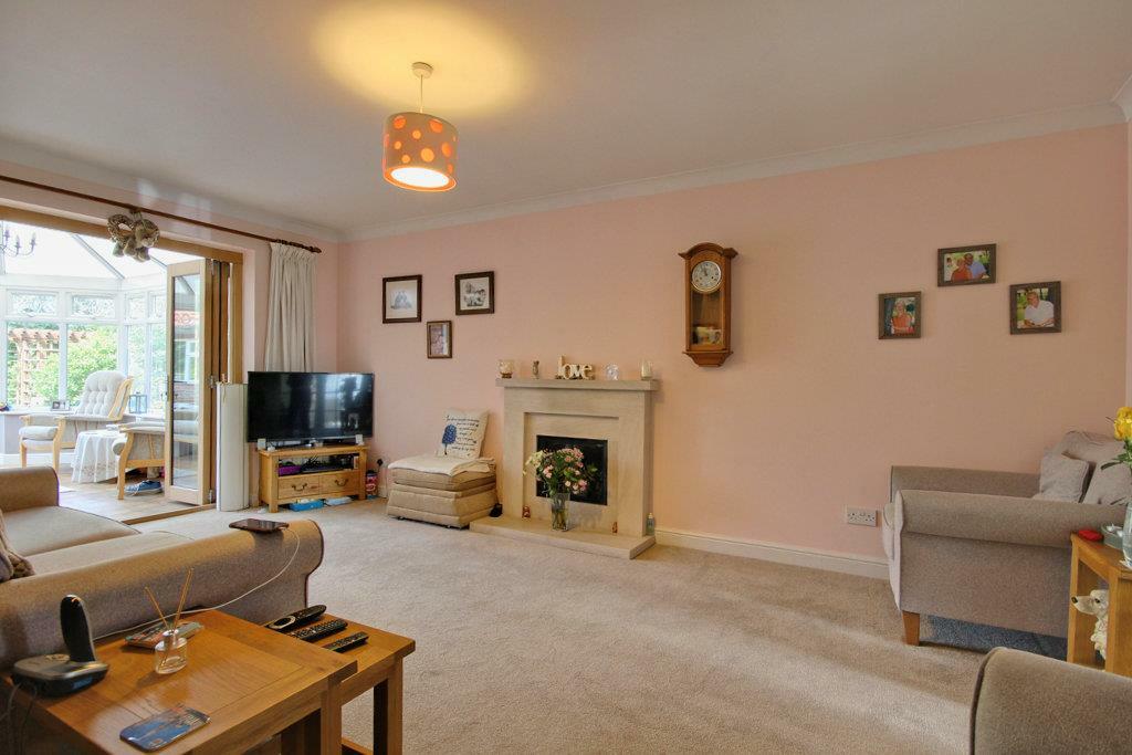 Lounge with limestone fireplace