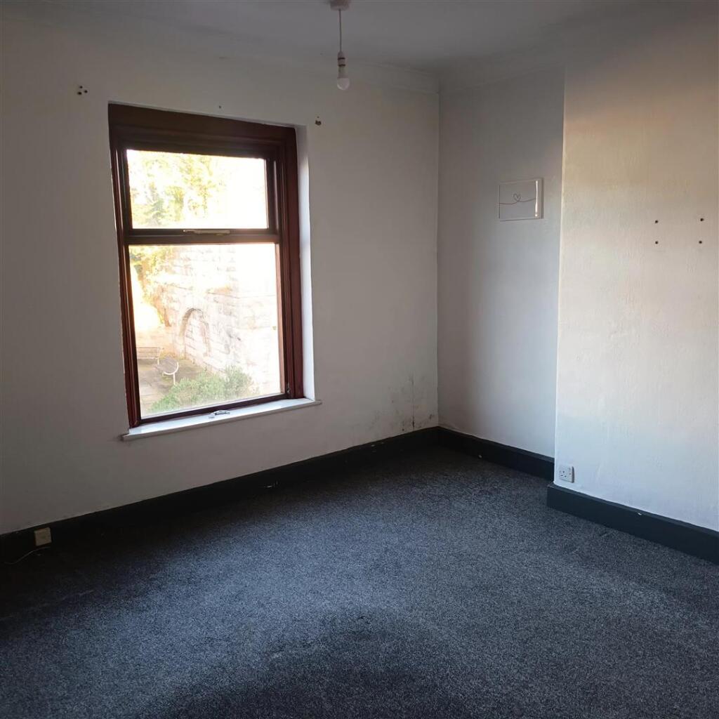 FRONT BEDROOM ONE