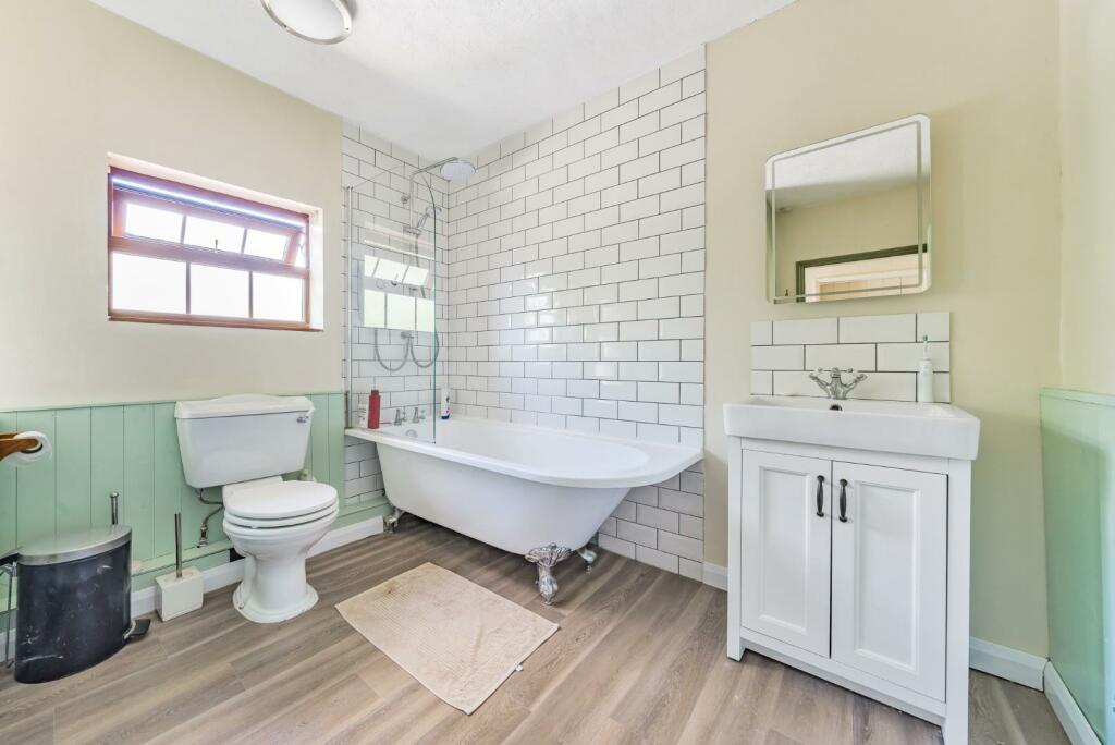 BATHROOM WITH SEPARATE SHOWER OVER.jpg