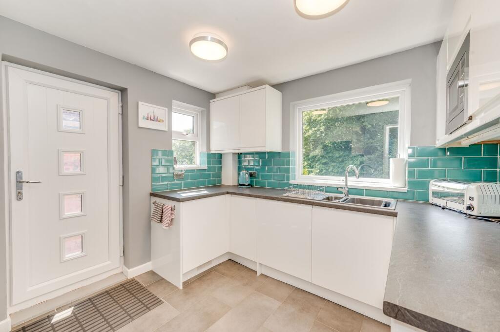 KITCHEN, LIVING ROOM AND DINING ROOM