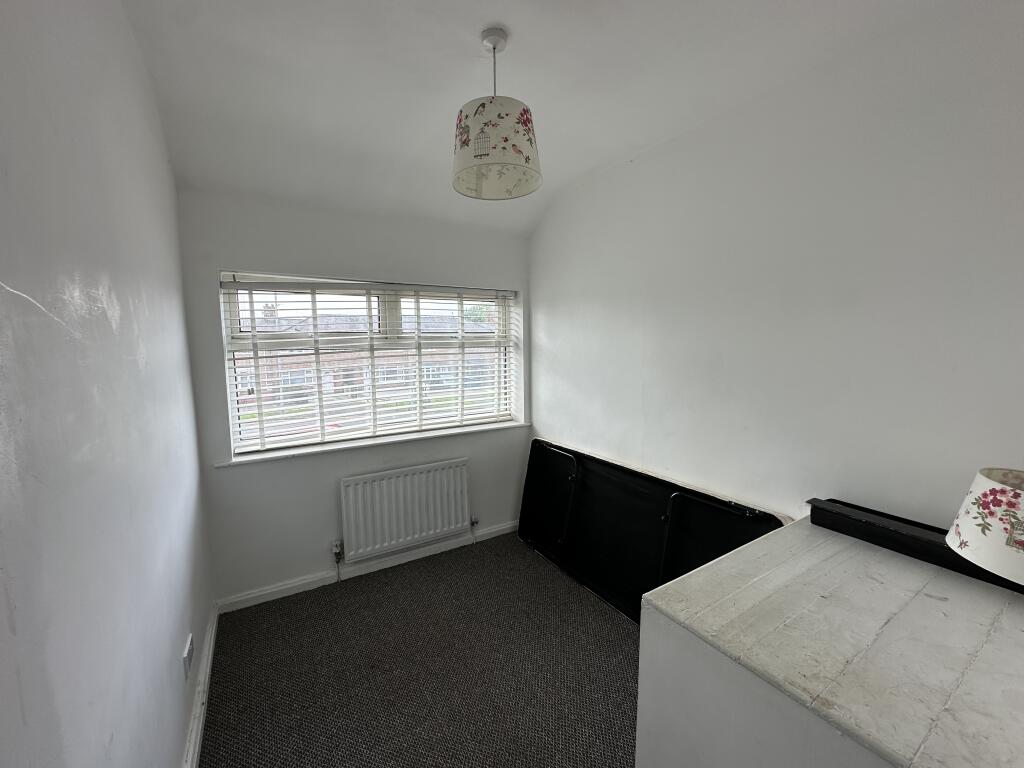 9. Bedroom three.JPG