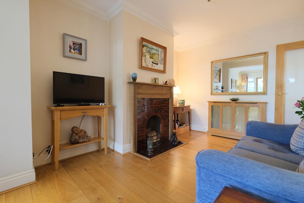 TV/family room, doors to the garden