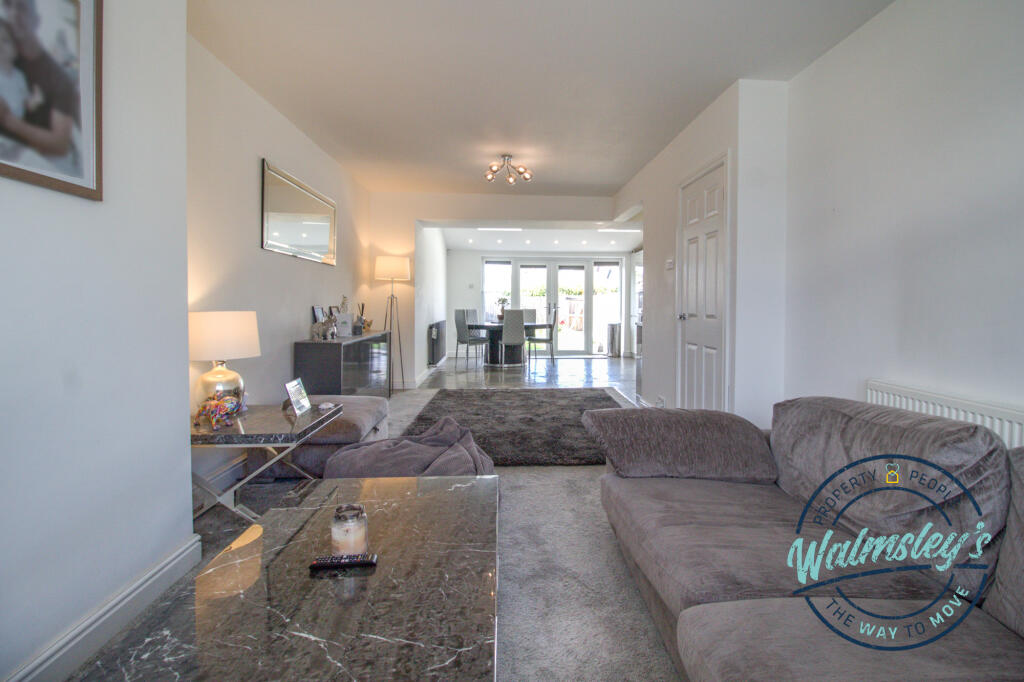 Sitting area with kitchen extension beyond