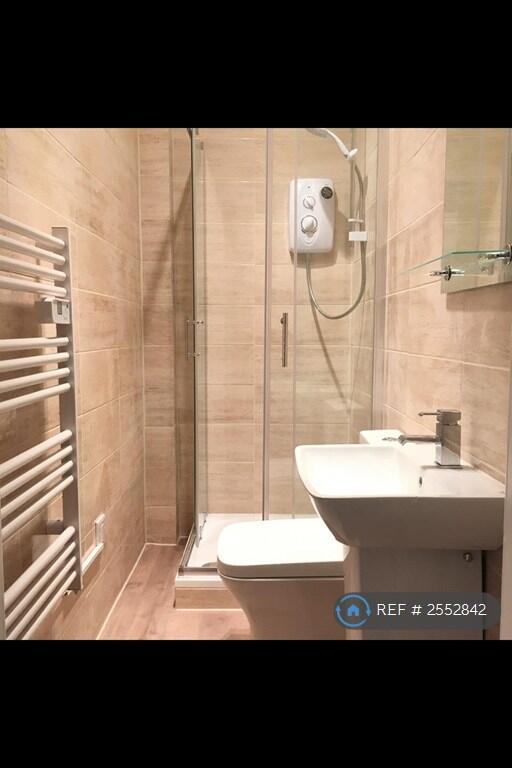Fully Tiled Shower Room
