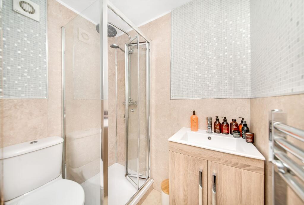 BEDROOM ONE EN-SUITE SHOWER ROOM