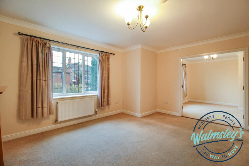 Sitting room with dioning room beyond