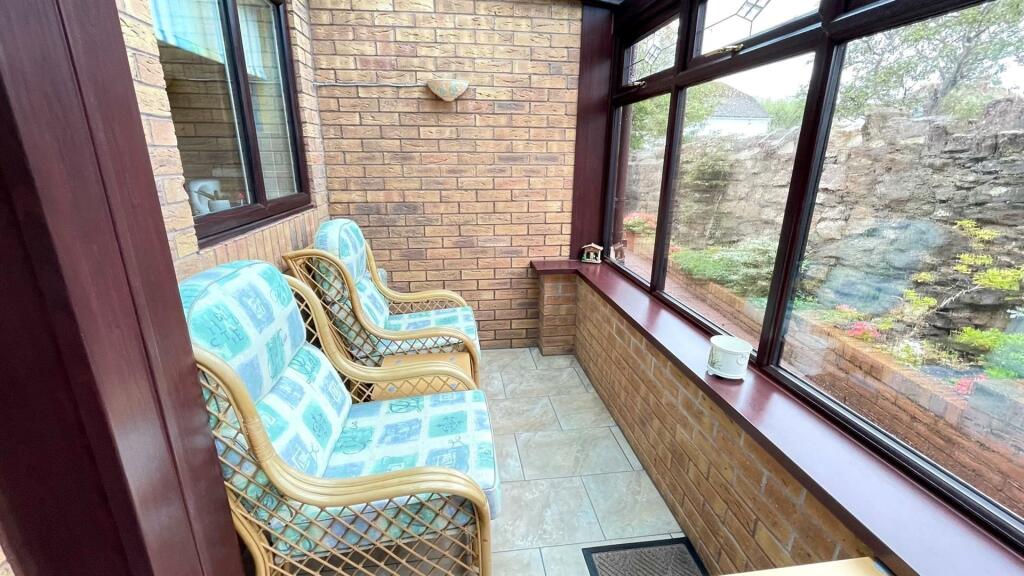 REAR PORCH/SUN LOUNGE