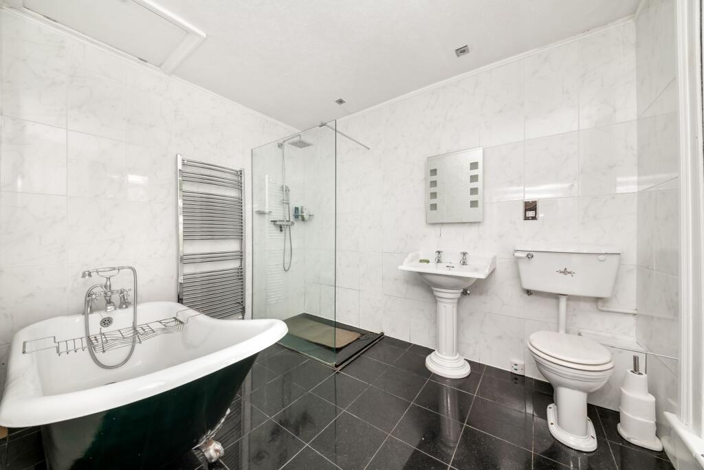 BEDROOM ONE EN-SUITE BATHROOM