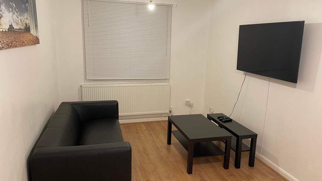 A cozy and inviting living room, perfect for re...