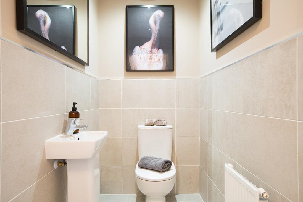 A handy downstairs cloakroom for guests