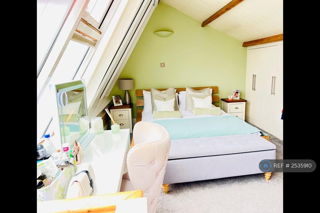 The Bedroom (With Fitted Wardrobes) 