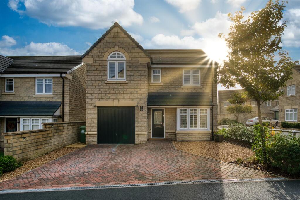 Front of the home (with sunlight).jpg