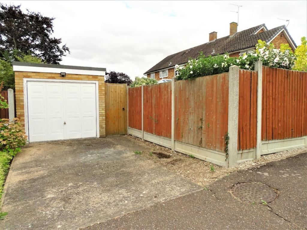 GARAGE AND PARKING TO REAR