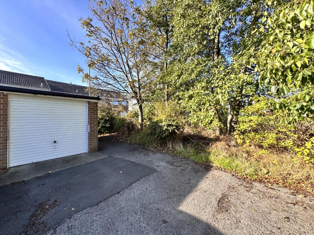 GARAGE &amp; PARKING TO THE REAR