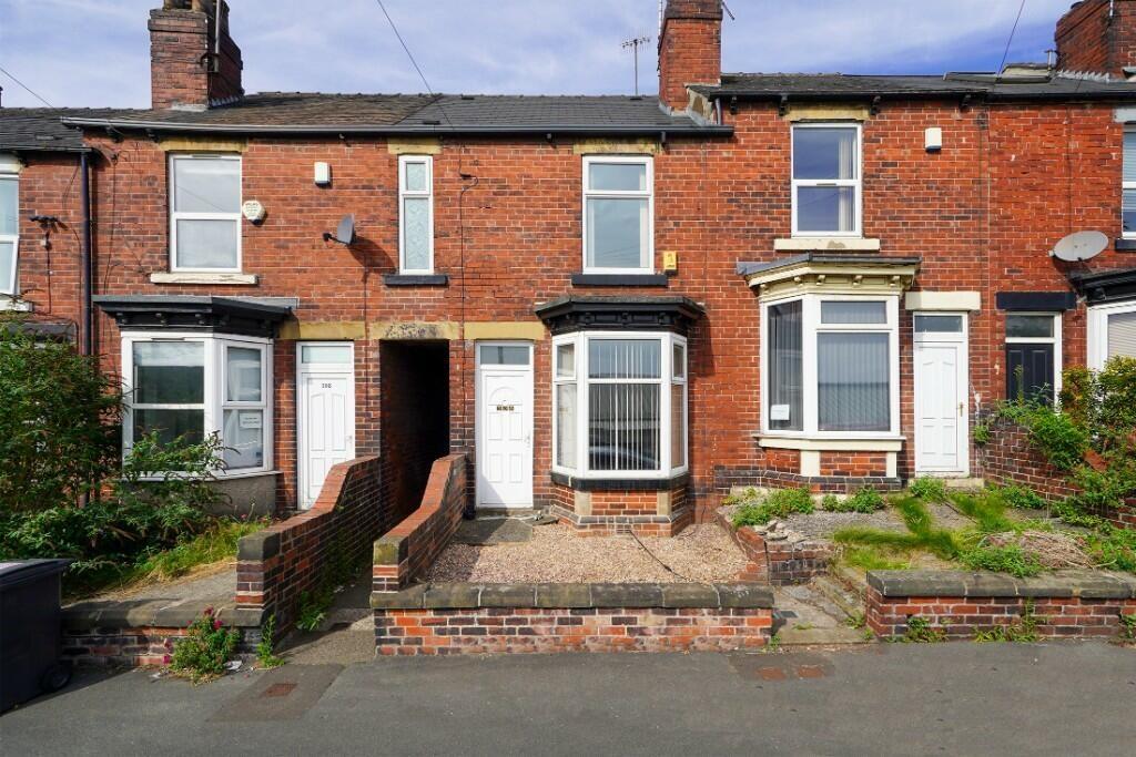 A charming terraced brick house with a traditio...