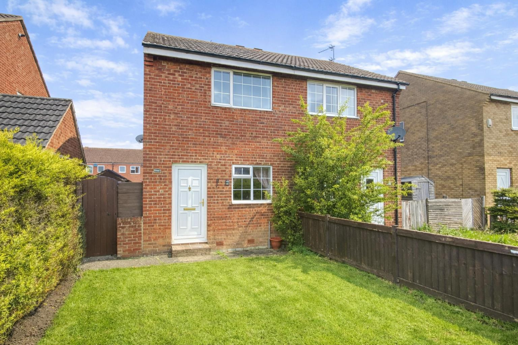 Red brick house on Silvertree Walk.png