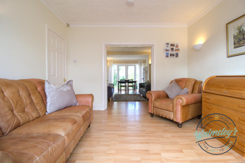 Sitting dining room with French doors between_