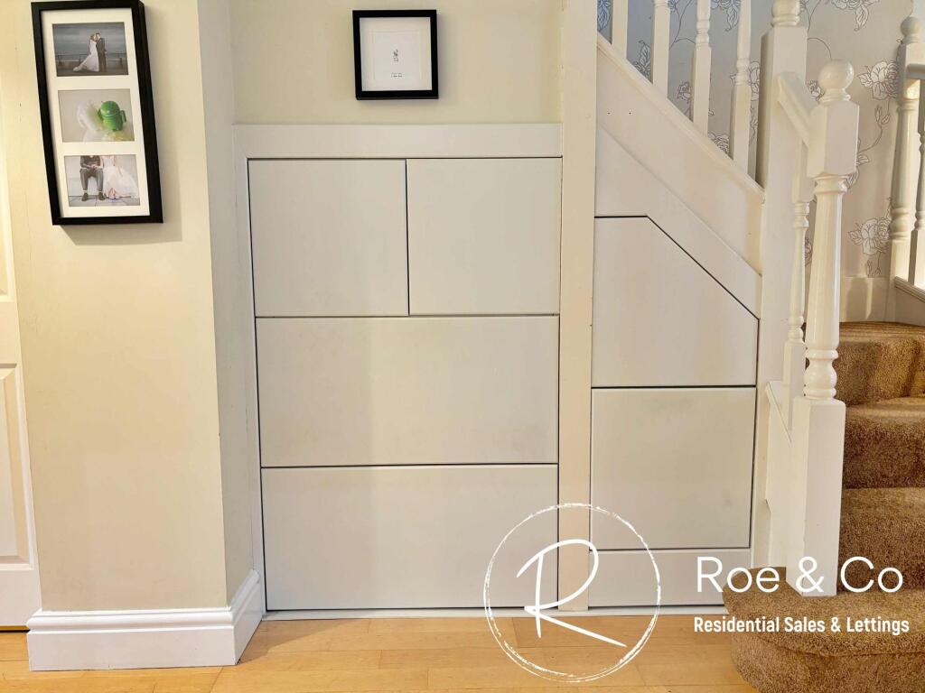 Storage within entrance hall