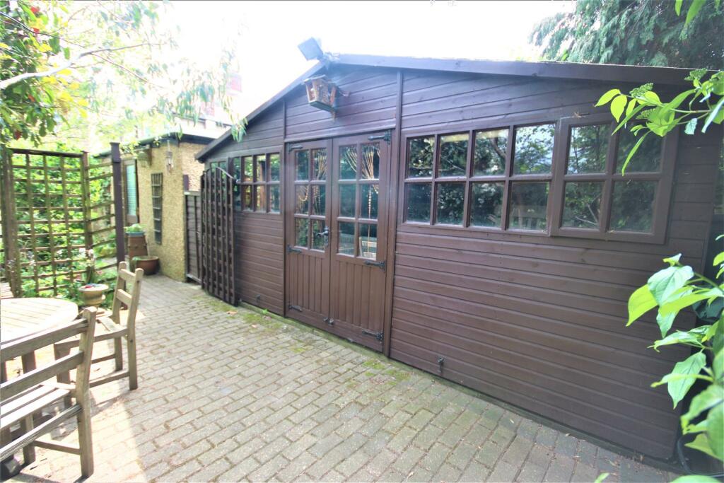 LARGE SUMMERHOUSE AT THE REAR: