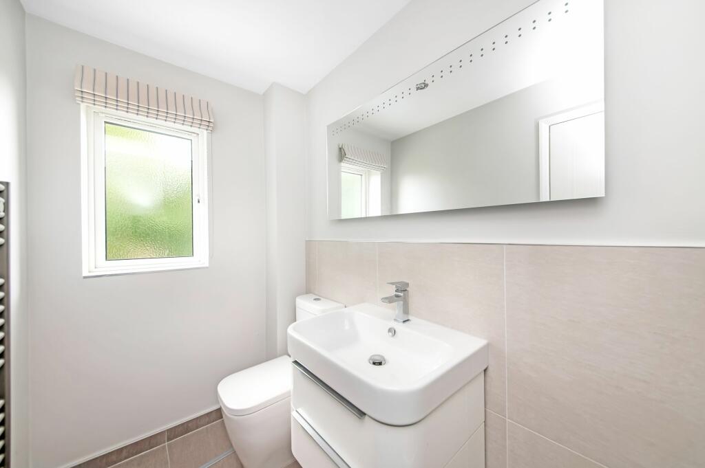 BEDROOM ONE EN-SUITE SHOWER ROOM