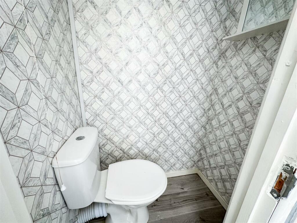 FIRST FLOOR CLOAKROOM